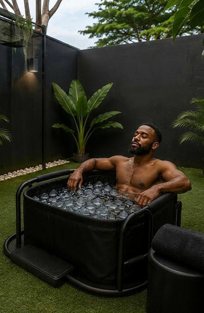 A man in an outdoor cold plunge tub filled with ice